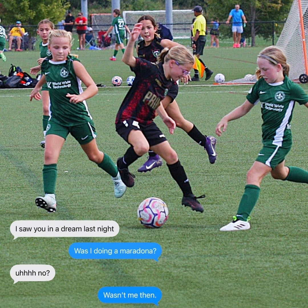 KC Legends player dribbling past defenders in a competitive match